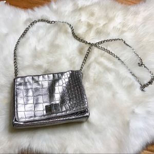 Metallic silver crossbody purse